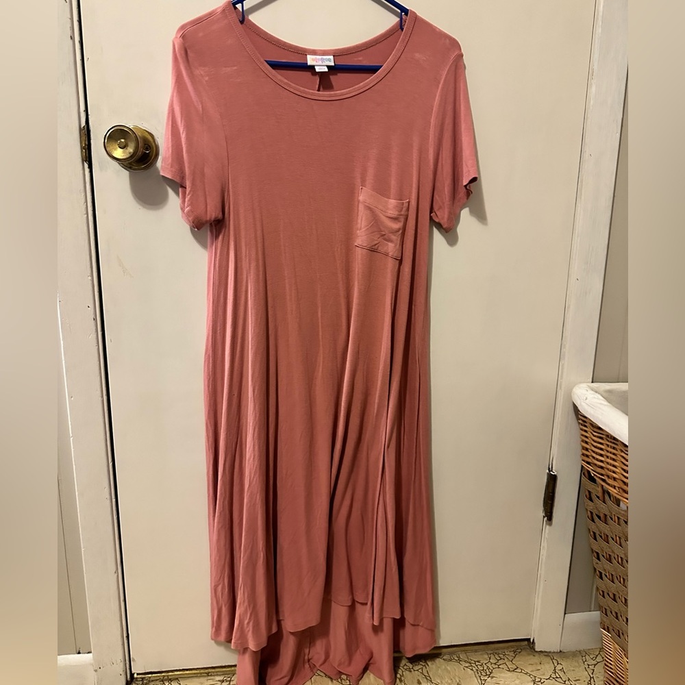 Lularoe peach dress. Very comfortable and cute. Size extra small.